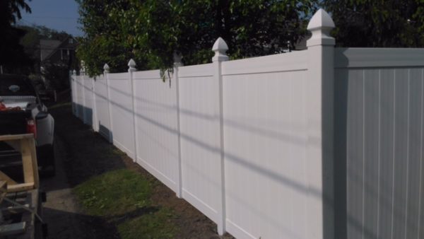 vinyl solid privacy with gothic post caps